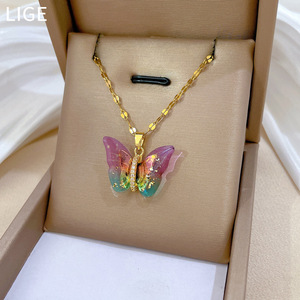 Collana con ciondolo a farfalla in resina di colore graduale oro acciaio al titanio collana di moda gioielli per regali - Product Image 4