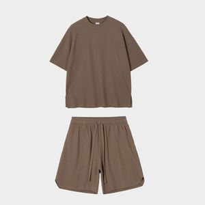 Conjunto de Dos Piezas Unisex de Algodón, Camiseta de Cuello Redondo y Pantalones Cortos con Cintura Elástica, Color Sólido, Corte Holgado, Ropa Casual de Verano - Product Image 5