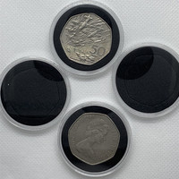 Capsules rondes transparentes avec inserts en mousse pour pièces de monnaie de 2 livres, 1 livre et 50 pence