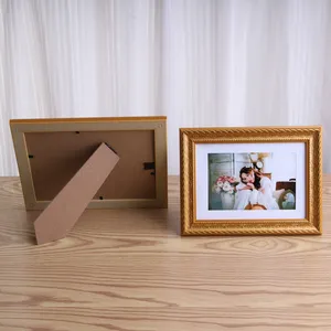 Vente en gros de <span class=keywords><strong>cadre</strong></span> <span class=keywords><strong>photo</strong></span> en plastique pour enfants de style vintage européen présentoir de <span class=keywords><strong>cadre</strong></span> <span class=keywords><strong>photo</strong></span> en pouces dorés pour studio de mariage - Product Image 4