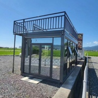 Profitez d'un design personnalisé avec notre maison conteneur à montage rapide avec panneau mural créatif pour serre ou camping en plein air
