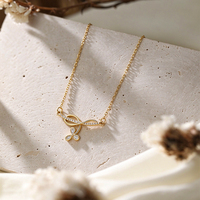 Collier trèfle à quatre feuilles SA en acier inoxydable plaqué or avec pendentif zircon, bijoux pour femmes, vente en gros, sans ternissement, en vrac