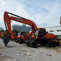 Excavadora de Ruedas Usada Doosan DX210W-9C de Segunda Mano de China, de Buena Calidad y Precio Económico, con Motor de 127kw y Brazo Probado, en Venta