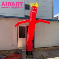 Figure de scène rouge gonflable, danseur d'air gonflable décoré d'émoticônes pour la publicité en plein air
