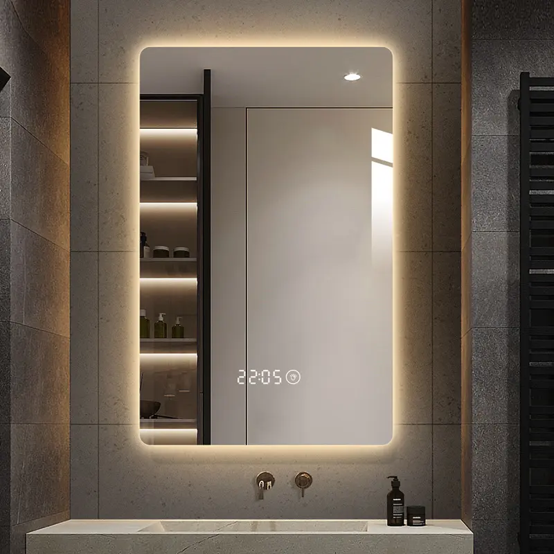 Cermin kamar mandi LED Modern serbaguna dengan jam Sensor pintar lampu sentuh penghilang kabut terpasang di dinding cermin rias Hotel-murah