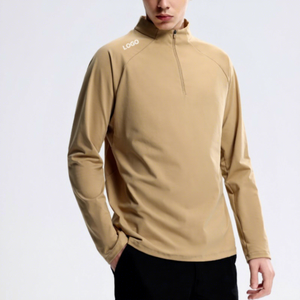 เสื้อเชิ้ตผู้ชายสีเบจแขนยาว คอตั้ง ซิป ¼  ผ้าโพลีเอสเตอร์ ระบายความชื้น ทรงเข้ารูป สีพื้น สำหรับเล่นกีฬา - Product Image 1