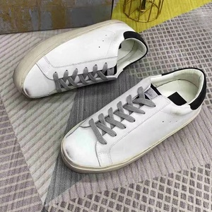 2026 Original Men Silver Genuine Leather Outsole Fashion Trend Breathable Lace-up Round Toe Sports Walking White Goose Sneakers - Product Image 1