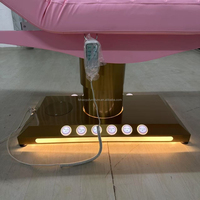 Table de massage électrique de luxe moderne pour hôtel, salon de beauté et spa, avec éclairage et revêtement en cuir PU