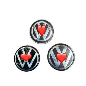 Nouvelles enjolives de roue en plastique <span class=keywords><strong>noir</strong></span> avec <span class=keywords><strong>logo</strong></span> 56MM/65MM/70MM pour <span class=keywords><strong>Volkswagen</strong></span> Lavida Sagitar Magotan - Product Image 1