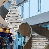 Lustre en cristal à anneaux spirales, luminaire suspendu sur mesure à plusieurs boucles pour hall d'hôtel, atrium et plafond haut