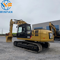 Disposition ergonomique du poste de commande, machine de construction d'occasion CAT 320D, réduit la fatigue du conducteur