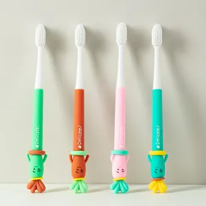 Cepillo de dientes para niños de cerdas suaves en forma de zanahoria personalizado lindo de dibujos animados de alta calidad