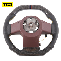 Volant en fibre de carbone véritable TDD compatible avec Nissan Frontier Xe 4x4 Navarra 2004 - 2013
