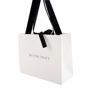 Sacs de shopping en papier d'art personnalisés de luxe avec logo, poignée longue, recyclables, design personnalisé pour l'emballage cadeau et l'utilisation professionnelle - Product Image 1