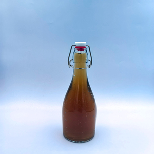 Bouteille en verre transparente ronde de 500 ml 400 g avec bouchon à bascule métallique, en promotion, prix réduit - Product Image 1
