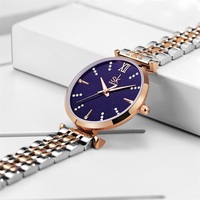 Montre à quartz pour femme SHENGKE en alliage d'acier inoxydable avec cadran en verre, aiguilles, résistante à l'eau