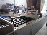 Distributeur professionnel de Machine de production automatique de gâteau de beignet de Yufeng avec déposant de pâte et fabricant de gâteau d'anneau de dosage précis