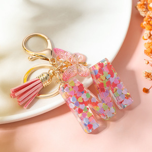 Porte-clés en résine avec breloque papillon et pompon, alphabet coloré, accessoire de sac, bijoux DIY pour étudiants - Product Image 4