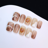 Ongles press-on faits main effet œil de chat dégradé marron, motif marbré et lignes dorées, forme carrée, faux ongles, kit de manucure de luxe