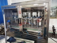 Machine de remplissage de haute précision machine de remplissage de liquide automatique machine d'embouteillage de liquide