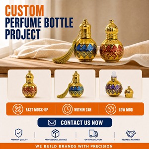 Flacone Vuoto Personalizzato per Profumo Attar, in Vetro con Astuccio in Filigrana Dorata Smaltata, Ricaricabile, Rotondo, per <span class=keywords><strong>Oud</strong></span> - Vendita all'Ingrosso Diretta dalla Fabbrica - Product Image 1