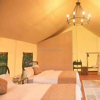 Tente de glamping beige quatre saisons à deux étages en toile imperméable, tente de safari de luxe pour hôtel