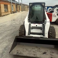Chargeuse compacte verticale Bobcat S300 d'occasion, 1361 kg, avec moteur Kubota V3800 et godet de 0,5 m³ pour travaux de terrassement et de construction