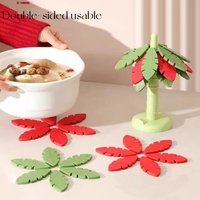 Tapis de table en forme de feuille résistants à la chaleur et esthétiques pour décorations de Noël