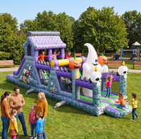 Structure gonflable Halloween Maison Hantée avec toboggan et parcours d'obstacles pour enfants, idéale pour fêtes, événements et location de jardin