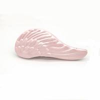 Logo personnalisé en gros ailes d'ange portable démêlant brosse à cheveux flexible antistatique en plastique de massage peigne