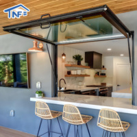 Fenêtre de cuisine extérieure pliante moderne en alliage d'aluminium avec cadre en verre trempé noir, auvent rabattable
