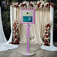 Xingruijia XRJ 2026 Photomaton ovale en métal avec écran tactile 15,6 pouces, conception étanche, ventilateur de refroidissement RGB, impression en libre-service