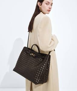 Bottega BV <b>Small</b> Andiamo Top handle bag in supple Intrecciato leather with signature knot detail and <b>sliding</b> cross-body Veneta - Product Image 1