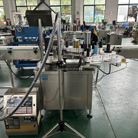 Machine automatique de remplissage et de capsulage antigoutte pour remplisseur de compte-gouttes d'huile essentielle liquide de bouteille de goutte en verre