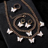 Ensemble de bijoux tendance plaqué or 4 pièces avec pendentif papillon, boucles d'oreilles, collier et bracelet de créateur pour femme, idéal pour les soirées