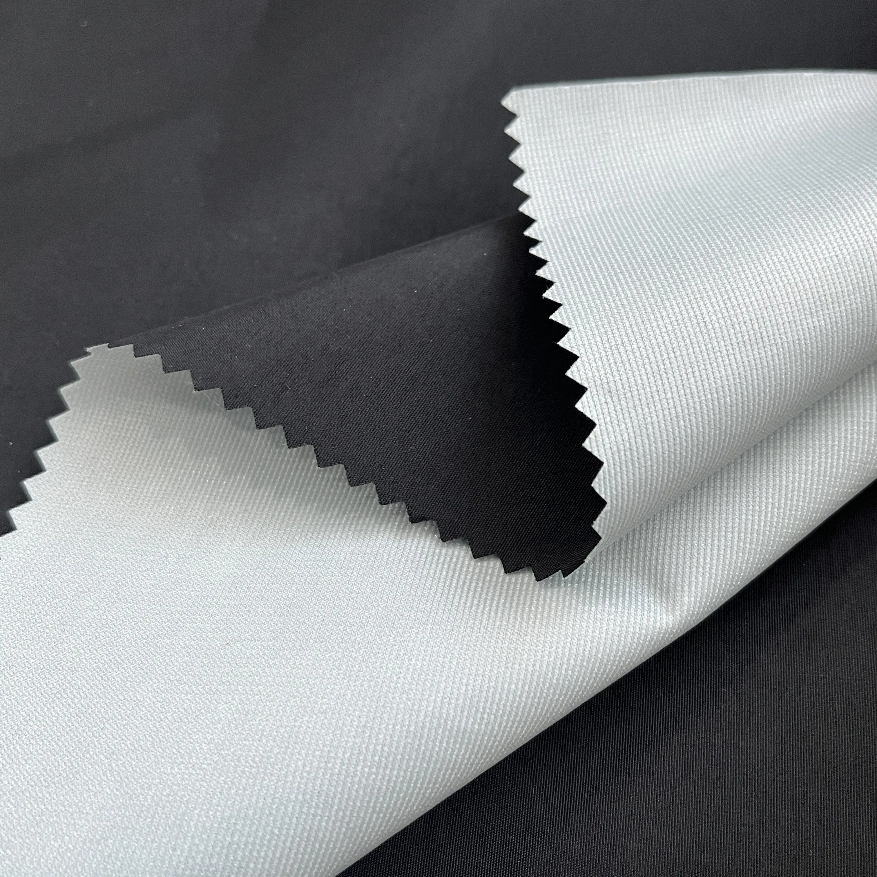 Impermeabile elasticizzato TPU legato giacca a vento Softshell poliestere tessuto esterno