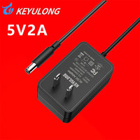 Adaptateur secteur mural AC-DC 5V 2A 10W avec prise US/UE, certifié CE, en matériau PC, pour passerelle intelligente, module LED, capteur de sécurité, OEM/ODM