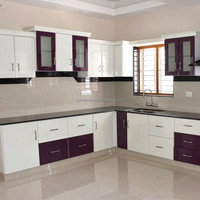 Armoire de cuisine avec support de rangement pour bouteilles de vin et système de suspension de verres à pied