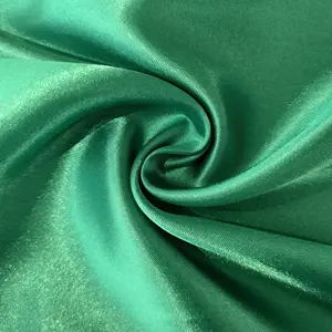 2023 New Fashion 100% Polyester Plain Shiny Satin Fabric For Gift Bags Sleepwear Bedding
