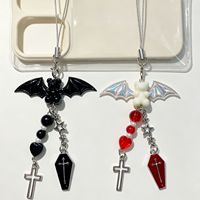 Breloque de sac tendance et mignonne, style gothique, avec ours, ailes laser, cœur et croix, très populaire en Europe et en Amérique