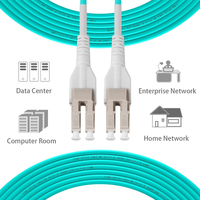 Kabel Patch Fiber Optik Uniboot Polaritas Interchangeable LC/PC OEM Supply G652A1 G657A2 LSZH untuk Kabel FTTH Pusat Data AI