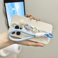Coque de téléphone minimaliste unie mate pour iPhone 17 16 15 ProMax avec lanière de poignet motif coquillage et étoile de mer