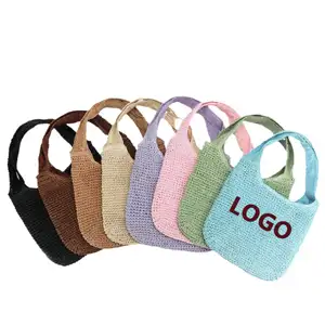 Bolso de paja grande suave tejido a mano de moda al por mayor, bolso de hombro de paja de verano, bolso de mano de playa para mujer