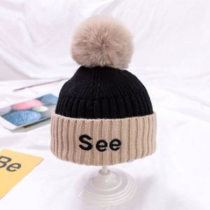 Bonnet bébé en laine tricoté chaud avec pompon assorti pour l'automne et l'hiver - Product Image 2