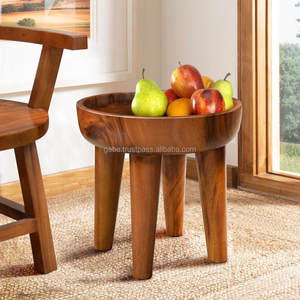 Modern <b>round</b> <b>side</b> <b>table</b> featuring a unique concave design, securely displaying items with elegance; handcrafted from a single - Product Image 3