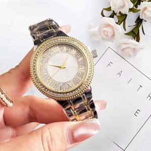 Reloj de Mujer en Dos Tonos, Dorado y Plateado, con Bisel Completamente Adornado con Piedras de Imitación, Esfera con Diseño de Rayos de Sol, Números Romanos, Brazalete de Metal, Reloj de Pulsera de Lujo Brillante para Dama - Product Image 1