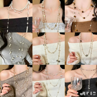 Français Long géométrique fleur perle collier mode chandail chaîne lumière luxe pour femmes mode pendentif colliers en gros