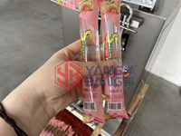 Machine d'emballage automatique verticale pour bâtonnets de glace, machine de remplissage et de scellage pour jus de fruits et sucettes glacées