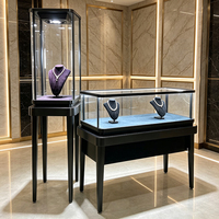 Présentoirs à bijoux en verre noir de luxe avec éclairage LED, vitrine de comptoir pour boutique, collier, bijouterie, personnalisable