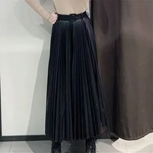 Conception de jupe en cuir pour dames personnalisées Jupe plissée en similicuir véritable pour femmes noires avec ceinture